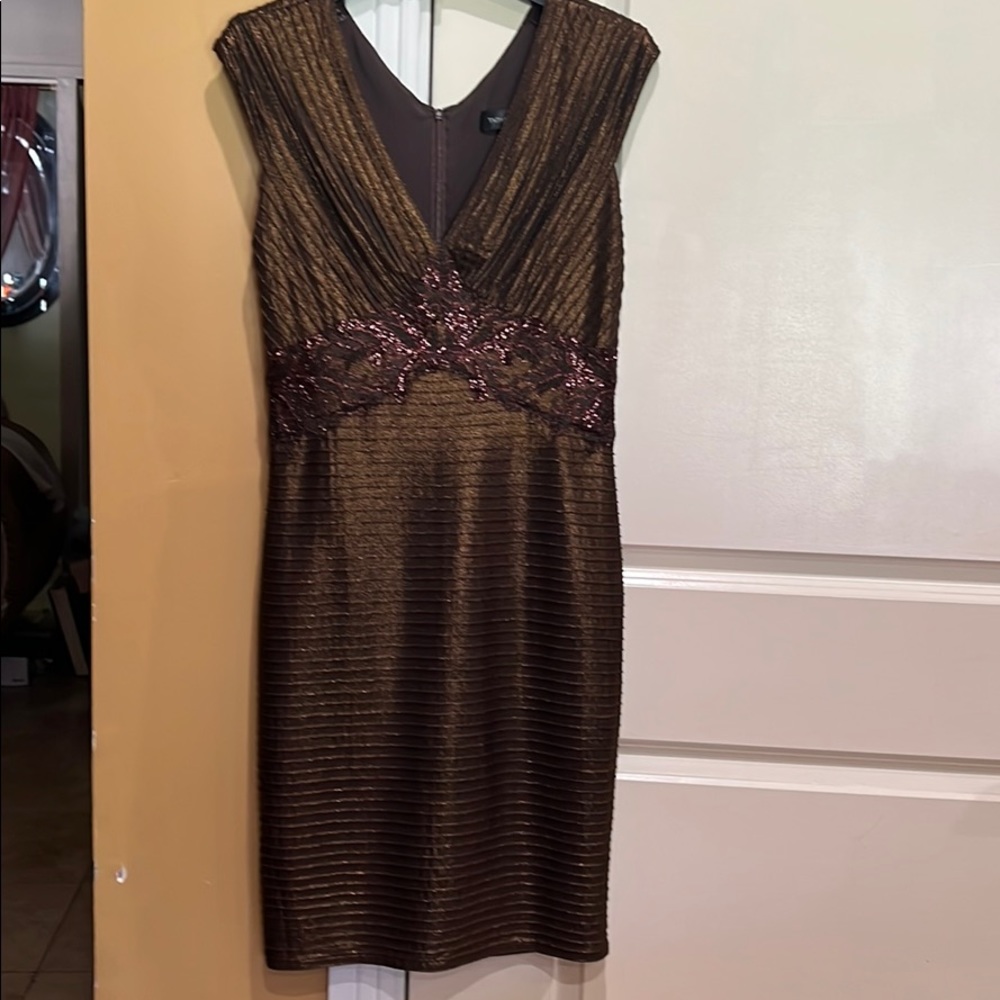 Tadashi Shoji new condition dress. Bronce color